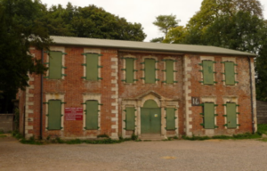 A boarded up building.